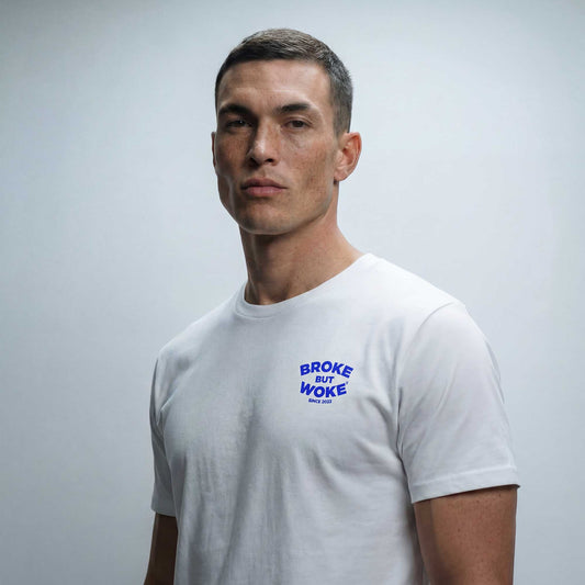 Broke but Woke FC organic cotton t-shirt worn — lifestyle front view by Woke FC