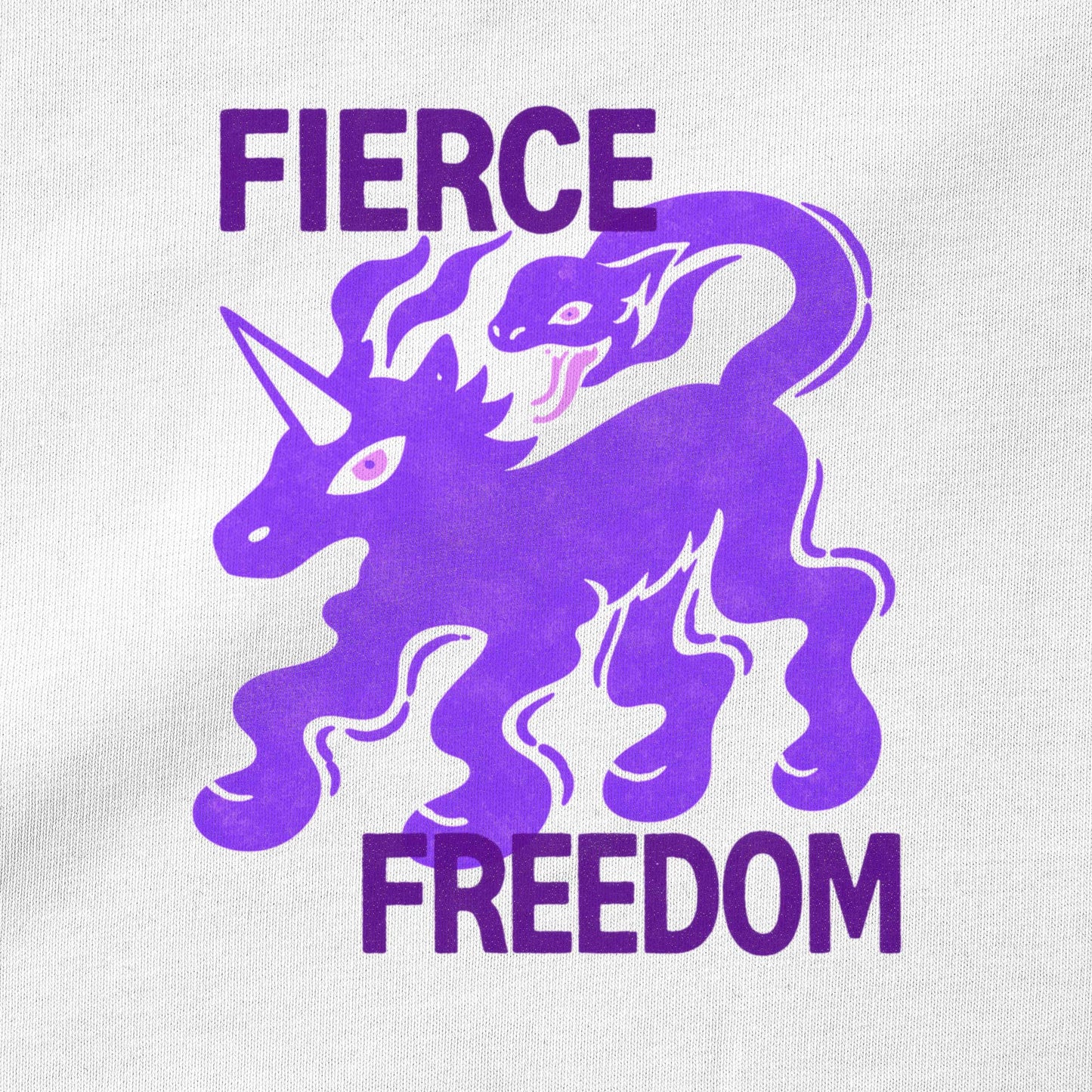 Close-up of unicorn and snake graphic motif on Fierce Freedom organic cotton t-shirt — Woke FC