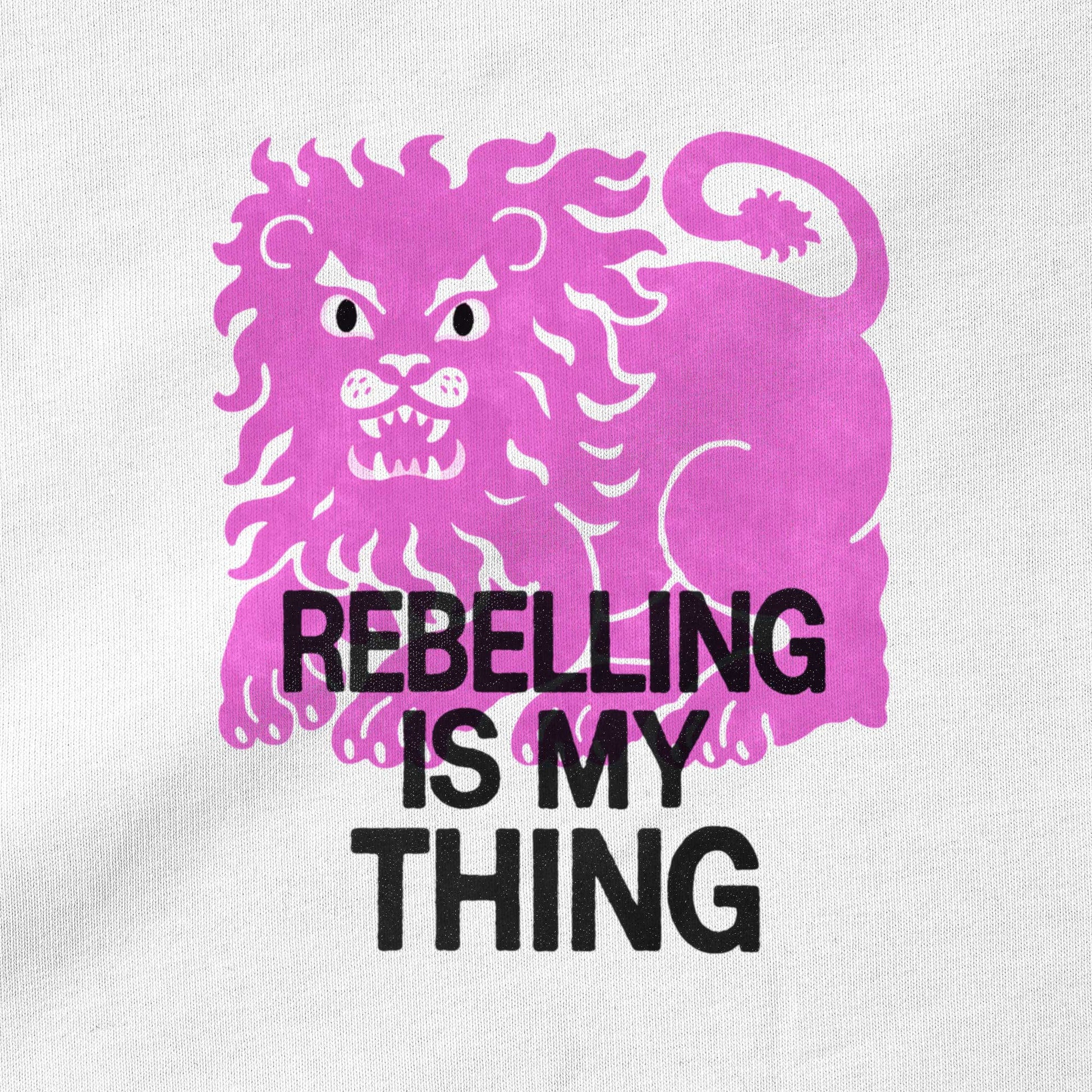 Close-up of proud lion graphic motif on Rebelling is my Thing organic cotton t-shirt — Woke FC