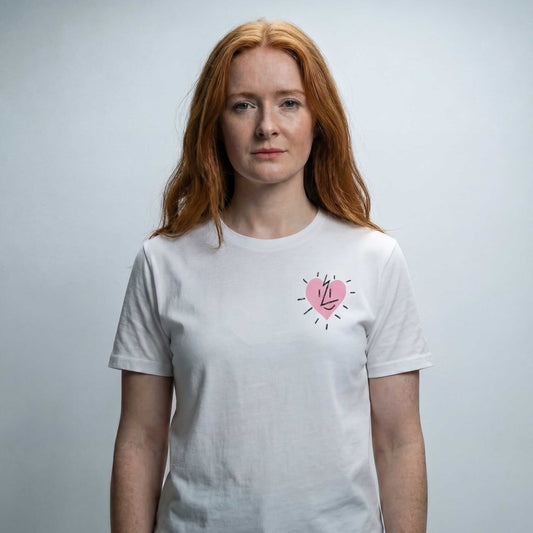 We Love Curves organic cotton t-shirt worn — lifestyle front view showing body-positive slogan by Woke FC
