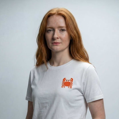 Wisdom comes from Youth white organic cotton t-shirt by Woke FC — front view with crab graphic
