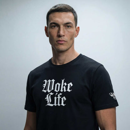 Woke Life black organic cotton t-shirt worn — lifestyle shot by Woke FC
